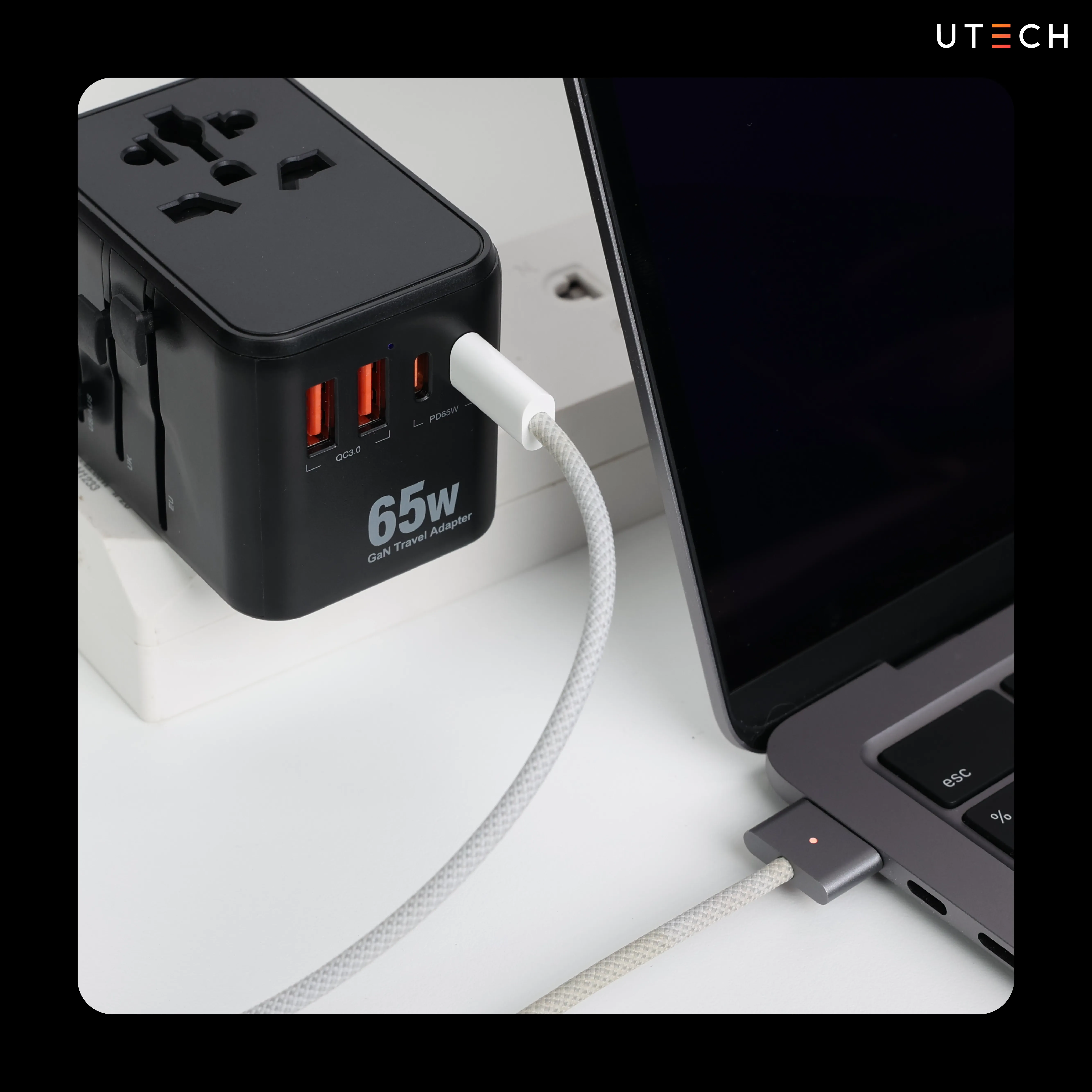 Universal adaptor 65W ชาร์จโน้ตบุ๊กผ่าน USB-C พร้อมพอร์ต USB สำหรับชาร์จอุปกรณ์หลายเครื่อง
